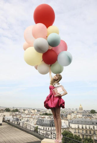 Floating Woman with Balloons